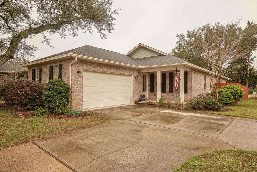 Gorgeous all brick 4/2 Huff built 2013 home with fenced, private back yard. Home looks new with modern white kitchen cabinets, granite, all hardwood floors though the home including bedrooms, tile in bath and laundry, 4 bedrooms, laundry room and extra large 2 car garage. The master suite has a walk in closet, walk in shower and double vanities. Second bath has a tub/shower combo. Kitchen has a coffee/wine bar, pantry, stainless steel appliances, tile back splash and beautiful white cabinets. Off the kitchen is a fabulous screened in porch overlooking the generous fenced backyard. This gorgeous home is a wow that is move in ready-better than new!