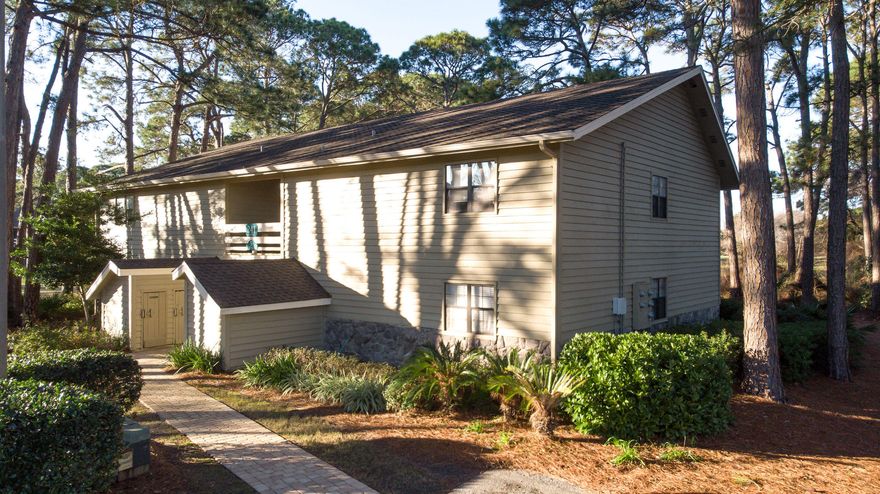 Nestled in the Pine Trees at the end of a cul-de-sac with an expansive golf course view within the gated Seascape resort is a delightful main floor unit perfect as a primary home, beach getaway or as an investment property. And only a few blocks from the beach! Perfect for making memories this well-appointed condo is ready for you, your family and friends Updates throughout include tile floor, kitchen including additional cabinets and counter, bath, including larger walk in shower, washer/dryer and more! You will love the large covered patio, private view and grill nearby. The resort offers golf, tennis, community pools and the Seascape Towne Center with restaurants and activities for the entire family. Call today to see this charming resort getaway.