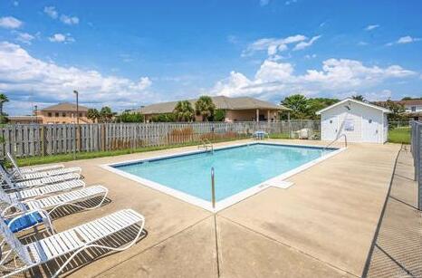 In the heart of Destin, this well maintained 3 Bed 2 1/2 Bath with 1 car garage and 1 driveway parking this unit could be your beach home this year. Available Oct/1/2025 Community Pool, Lawn and Trash Included. No smoking, Pets - restrictions apply. The unit has Tile in the living room and kitchen, carpet in the bedrooms. Currently occupied. The community pool is a wonderful option to enjoy the sunshine. Located in the heart of Destin - schools, restaurants, shopping and entertainment. Enjoy the white sand beach and everything this beautiful area has to offer.