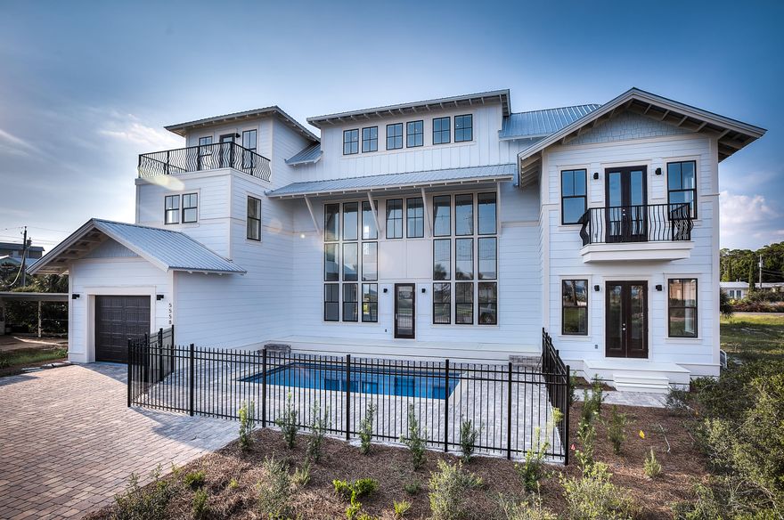 Quality new construction and just completed. Gulf views galore from every room.. Beach access is only steps away or sit in your private pool and watch the Gulf. Home has upgrades such as Bosch appliances,2 laundry rooms(one on first floor and one on 2nd), 2 masters, Marble counter,gas stove,etc.Home also has a bunk room and tower can also be used for extra guest sleeping area.