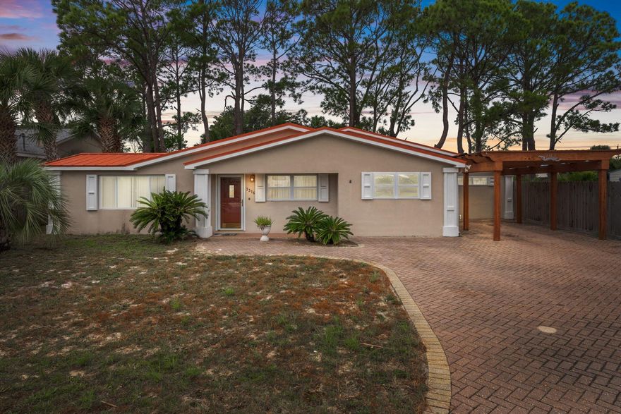 72 hr kick out clause. This charming home sits within walking distance from the world's most beautiful beaches. This home has so much to offer with three-bedrooms, two-bathrooms, on a double lot. As you enter the home you will find the main living area complete with vinyl floors and a large open window allowing the natural lighting to fill the space. As you move into the kitchen there are all stainless-steel appliances and a large pantry for storage, ample working space and a large floating island with a stainless-steel work surface and extra seating. Down the hall a designated laundry room can be found with cabinetry, shelving and a utility sink. The spacious master bedroom features three closets and a bathroom with two extra closets! The bathroom also features a bidet and walk in shower.