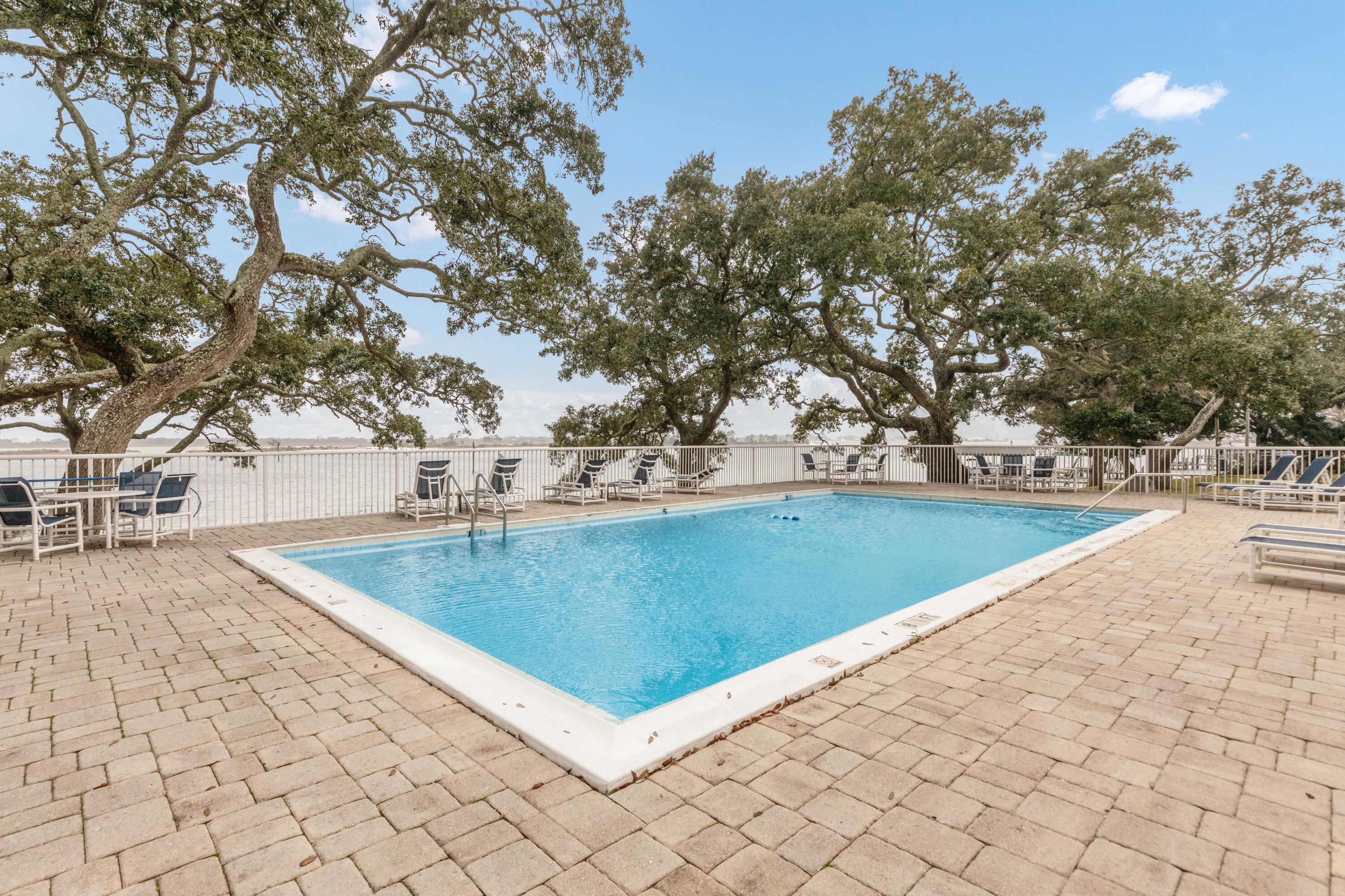 1BR/1BA condo on the Santa Rosa Sound! Located in The Cedars, a charming waterfront community, this ground-floor unit offers 640 sq ft of easy-care living--ideal for first-time buyers, investors, or downsizers. Features a bright, open layout ready for your personal touch. Community amenities include a pool, fishing dock, boat rack, picnic areas and coin laundry. Just minutes to Hurlburt Field, shopping, dining, and the white-sand beaches of Fort Walton. Enjoy a relaxed coastal lifestyle!! Schedule your showing today!!