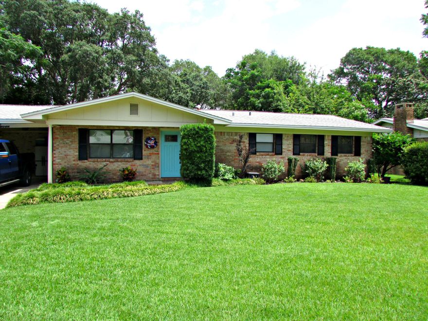 Exquisite renovated Brick home, walking distance to Vesta Heights Park Gourmet kitchen featuring Dual Wolf Convection stove, Colonial white granite island, & deep sink. Abundance of custom cabinets, drawers & natural light. Dine overlooking your family room with deep Fort Worth laminate flooring, recessed lighting & abstract-shaped opening in the ''trayed'' ceiling. Entertain in the Great room with skylight, fireplace (wood or gas) recessed lighting, & bar; opens to luscious back yard or carport. Indoor laundry has plenty of room for your additional chest freezer or storage shelving. Unravel from a long day in the lavish Master bedroom with his/her closets, parquet wood floors, & large custom tiled shower, & oversized vanity. Never run out of hot water w/the new tankless hot water heater!.