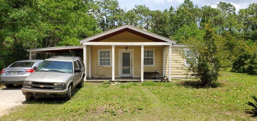 Here's Your Next Flip!Beautiful 3/2 in the HEART of Santa Rosa Beach! Large and unique floor plan, open lot adjacent. 2 covered patios, and large carport! This is your next beach house FLIP! Just minutes away from 30A and all the shops and hotels of Grand Boulevard, Grayton Beach, Watercolor, and Seaside! Come claim this property before it goes!