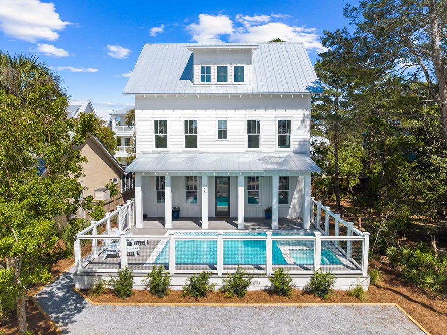 Experience unparalleled luxury at our newly constructed beach home, perfectly nestled just steps from Seagrove Beach and within walking distance to local shops and eateries. This stunning retreat features 5 bedrooms, including a bunk room with 4 queen beds, and 5.5 bathrooms, each with bespoke tile work, spacious closets, and private ensuites for ultimate privacy and convenience. The open concept living area boasts heated pool views, complemented by shiplap walls and premium finishes throughout.