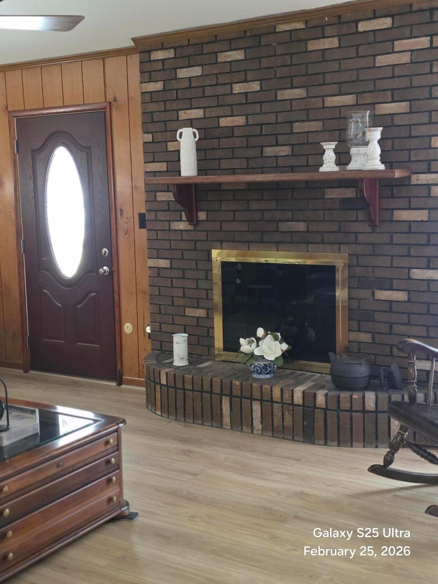 Don't let the age of this custom home fool you!   Just minutes from shopping, schools & post office sitting on almost 5+/- acres~ 4 Bedrooms, 2 full baths and 1/2 bath just off the kitchen~ Formal living and dining room and breakfast nook off the kitchen~ Den with fireplace with door opening to the back yard with an inground swimming pool~ Screened porch off the breakfast nook to enjoy the outdoors. Large laundry room and side entry garage~ Kitchen has large pantry and lots of cabinet space~ There is also a detached garage and storage building in the back yard~