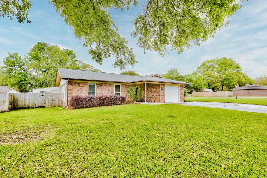 Beautifully move-in ready home in the heart of Shalimar centrally located to AFB base, shopping and beaches. The oversized kitchen with breakfast bar, granite counter-top, beautiful cabinets with under cabinet lighting, stainless steel appliances will inspire anyone to cook at home. The open living/dining room is perfect for gathering and overlooks the private fenced-in backyard. Extend the outdoor living space and enjoy your morning coffee under the  pergola with adorable lighting and listen to the sounds of the birds. This home also comes with a 10 by 10 electric shed perfect for a craft or work room. Yard has sprinkler system, no HOA and is ready for its new owners.