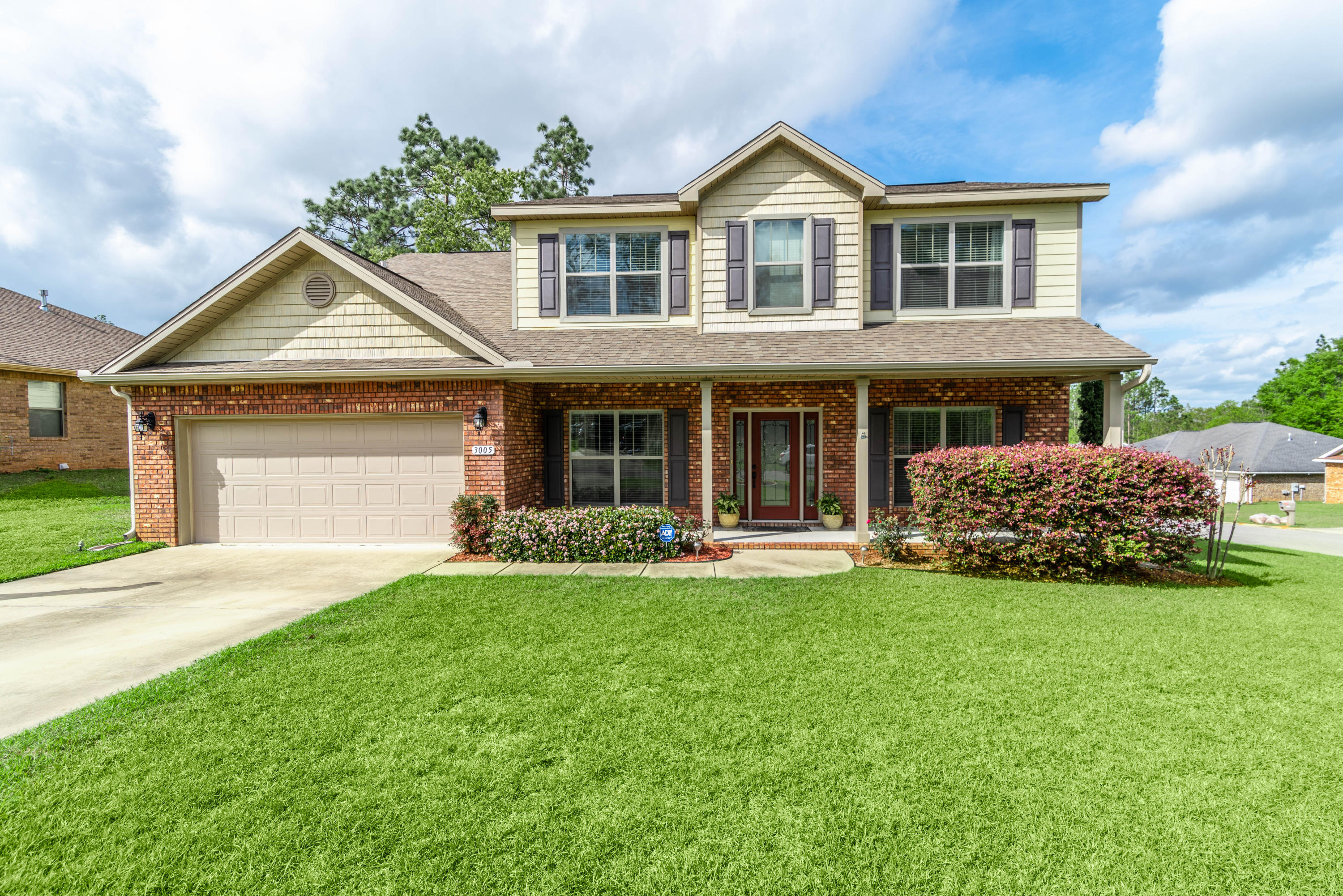 Welcome to your new, beautiful, immaculate home in the community of Brooke Estates built by Whitworth builders. Nestled near the Crestview Airport, this home is convenient to both Eglin AFB and 7th Special Forces Group. Enter the house to an 18' ceiling in the Foyer which adds grandeur. The Formal areas (living room/dining room) as well as the den boast 9'ceilings with large open kitchen, granite and tiled backsplash, and a lovely extra large island, and breakfast area. The home is freshly painted, and has beautiful Vinyl hardwood-finish flooring throughout the downstairs areas. The upstairs is carpeted with upgraded wall to wall carpet in all four bedrooms.