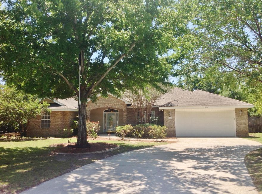Backyard OASIS! All Brick, 4 bedroom home with 3 full baths, gas FP, heated and cooled Florida room, incredible in-ground pool, Pergola, plus Huge workshop with A/C and electricity. All on just under 1/2 an acre in beautiful Raintree Estates! Split bedroom floor plan is perfect for home office, or 4th bedroom. Spacious kitchen has gas cook top, double ovens, and center island with reverse osmosis in sink. Large Master bedroom has doors to Florida room. Master bath has double vanities, walk in closet, tiled shower with seat, and separate soaking tub. Whole house, on demand tankless water heater and central vac add to the luxuries of this home. Backyard has hot tub pad and electric, beautiful pergola, pool with new liner, double gates and a shed. 2 car garage has pull down stairs to attic.