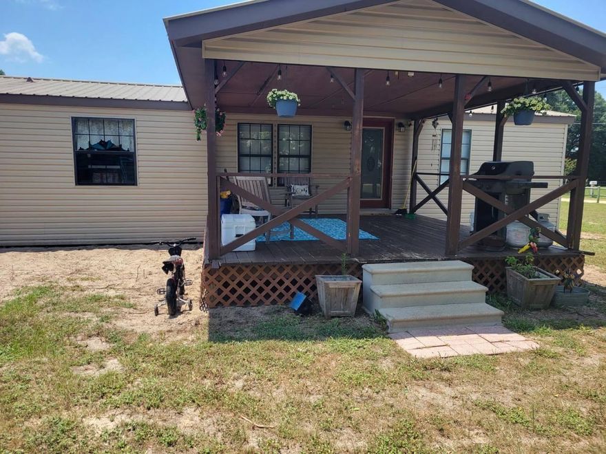 If you're looking for a peaceful and serene living experience, away from the noise and congestion of the city, then this charming country home might just be the one for you. Despite its rural location, it is conveniently situated within 5 minutes of the center of Defuniak, which means you can still enjoy the best of both worlds.
The house itself is spacious and well-maintained, with a large covered front porch that provides a perfect spot to relax and unwind on hot summer days. Inside, you'll find a beautifully designed living area that opens up to the dining area and den, providing ample space for all your family gatherings.  Property to also include a large storage building that can be used as a garage or workshop. A must see hidden gem.