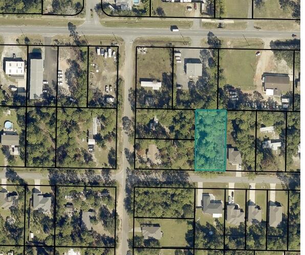 Excellent building lot in Navarre, FL near many new homes and less than 10 minutes to Navarre Beach! This wonderful Lot is .46 acres: 100 feet road frontage and 200 feet deep. This Desirable Property is perfect for building a new home. Close to Beaches, Bases and Shopping!