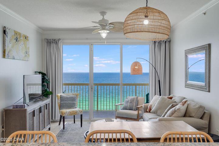 Rare opportunity at Celadon Beach Resort and an absolute must see! Experience luxe seaside living with a toes-in-the-sand location directly on the emerald waters of the Gulf. Celadon 1205 showcases one of the most sought-after floorplans in PCB: a true Gulf-front master suite with balcony access--a rarity in one-bedroom condos--plus a separate bunk room and two full baths. Because the property has a separate bunkroom, it lives and rents as a 2br/2ba, comfortably sleeping six. The open layout, 9' ceilings, and triple panel sliding glass doors fill the space with natural light and frame breathtaking Gulf and sunset views from the balcony, living room, dining room, kitchen, and master suite.