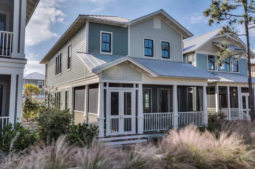 This home is in the coveted Phase 1 of the community overlooking a beautiful pond. Landscaping is more mature in this area and creates the utmost privacy on all 3 covered/ screened porches. Beautiful wrap around porch on the front of the home allows for 2 seating areas. You enter the home through double wooden Anderson doors with custom made wooden shutters. This thoughtfully laid out floor plan includes 10 foot ceilings throughout, dark pine floors, wide trim, and crown moulding in the 1st floor living and kitchen areas. Kitchen is complete with stunning upgraded grey glazed cabinets, tile and glass backsplash, under cabinet lighting, gas cooktop and more. Flexible room on 1st floor can be used as a bunk room or office- it has a door and a closet for storage! Up the stairs