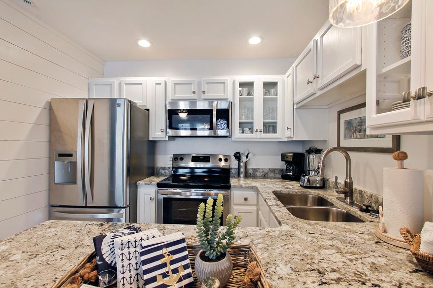 Welcome to AquaSplash at Grand Caribbean West! This ideal summer vacation rental was just completed in May 2018! Since May 15th, 2018, the condo has OUTSTANDING RENTAL NUMBERS! Gross Total Rent $33,821. Net Rental Revenue $22,892. *PLEASE NOTE: THESE NUMBERS ARE REFLECTIVE OF ONLY 7 MONTHS ON THE RENTAL MARKET* As of 2/8/2019, there is $15,968.15 (Gross) and $10,922.15 (Net Rental Revenue) booked for 2019!!!!Enjoy the comforts of a newly remodeled condo that features brand new furniture, fresh paint, shiplap wall detail, brand new appliances, upgraded lighting fixtures and fans, granite countertops, flooring and more!! The Master bedroom features a King size bed that will make you feel right at home! No detail was spared when remodeling this beautiful condo!