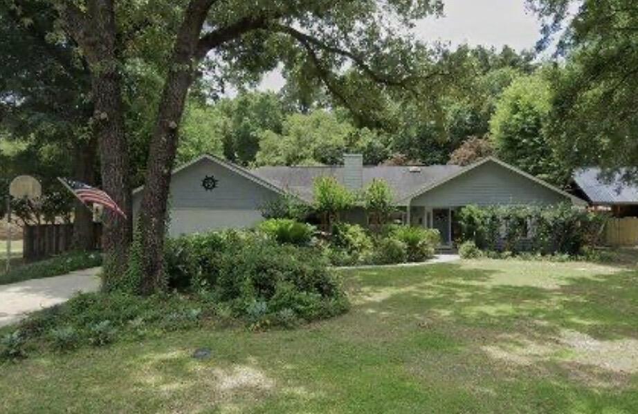 3 bedroom, 2 bathroom home with 1,538 sq ft of living space on nearly half an acre in a quiet Milton cul-de-sac. The living room features vaulted ceilings, a fireplace, and large windows for natural light. Outside you'll find a screened in-ground pool with a recently replaced pump (2025). The water heater is about 2 years old. Hot tub is non-functional and sold as-is.The property is being sold as-is and will need updates including a new roof, paint, and flooring. This is a great opportunity for investors, flippers, or buyers looking for value-add potential. Convenient location near I-10, shopping, schools, and NAS Whiting Field.