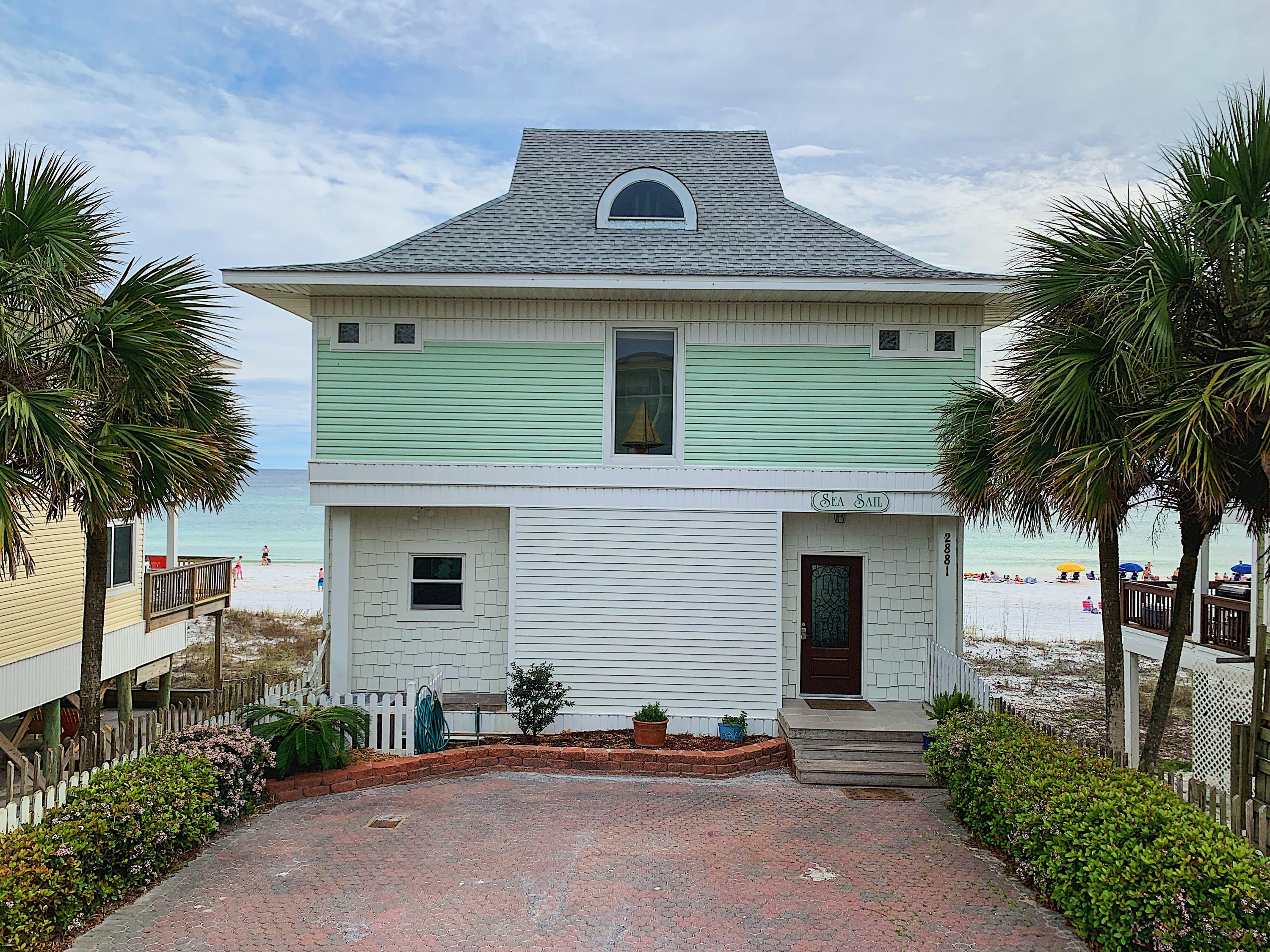 Breathtaking views! ''SeaSail'' is your slice of paradise. This beautifully remodeled 3 bedroom 3.5 bathroom gulf front home is NOT in an HOA. No restrictions! This home offers endless water views from every room! On the main floor, the open floor plan offers plenty of spacious living, with a fully remodeled kitchen featuring new stainless appliances, new solid wood cabinets, and beautiful leather finish granite. The main floor has access to a large deck over looking the gulf through new hurricane rated sliders. The entire house has new tile floors and extensive use of blue pine for ceilings and walls. The master bedroom on the second floor has a private bath, offering double vanities, separate water closet, and a new tile shower as well as access to a semi-private balcony.