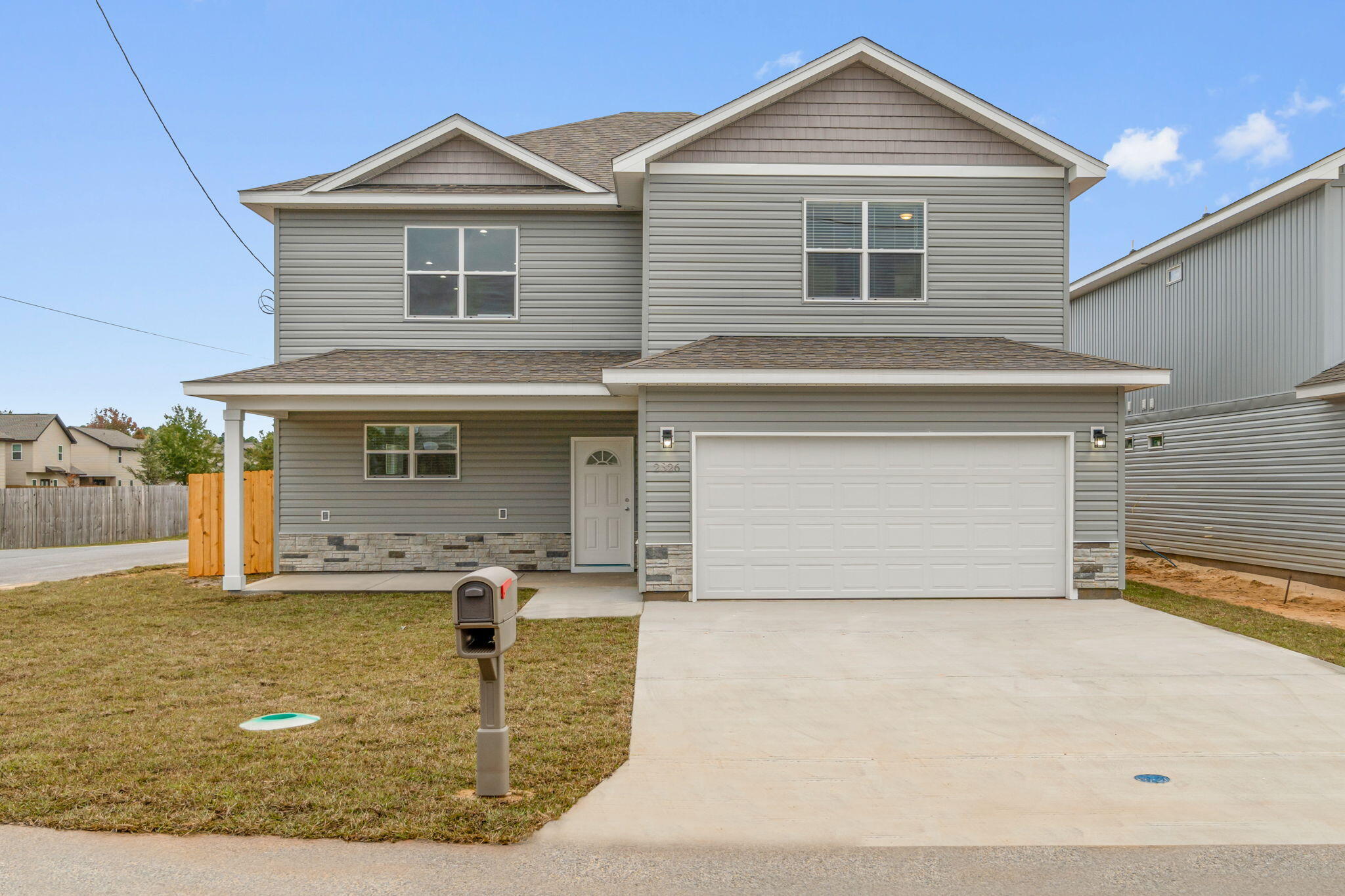 CONSTRUCTION COMPLETE: This 3 bedroom/2.5 bath home has been designed for maximum versatility and livability. The interior boasts a welcoming foyer, open concept floorplan with 20'' ceilings, open concept living, dining and kitchen area, a 1st floor master suite, a 1st floor powder room and 1st floor laundry. The kitchen will have beautiful granite counters, tile backsplash, new stainless-steel appliances, a breakfast bar and is open to a spacious, light filled living and dining area. The 1st floor master bedroom is generous in size and the master bath has a double sink vanity, tiled shower, and spacious walk-in closet. Upstairs plays host to both guest bedrooms, a full guest Jack and Jill bath, and a large open loft area for added charm and endless possibilities. The laundry room can be