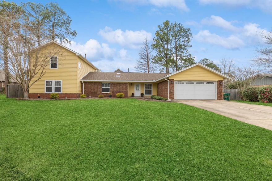 ***Seller offering a buyer's credit of $7500 with acceptable offer***Nestled within the Palm Estates neighborhood of Niceville, this 5-bedroom, 4-bathroom home is a short drive from military bases and beaches of the Emerald Coast. Offering 2792 square feet of living space, this residence exudes charm with its hardwood floors and a welcoming fireplace in the living area. The kitchen showcases stainless steel appliances, new cabinets, and granite countertops. Downstairs, the master suite stands out with hardwood floors and an en-suite bath with his and her closets. An additional three bedrooms, one featuring its own private bath, are positioned on the main floor. Walk upstairs and discover a versatile bonus room/5th bedroom complete with an office nook, wet bar, and additional bath,
