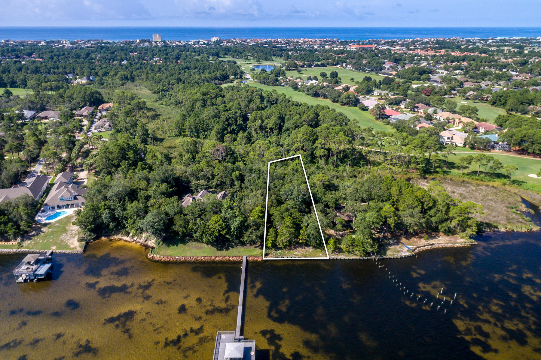 Tucked away at the Walton Coutny line you find this Gem of a property! Bay front, Great elevation, beautiful Magnolia and Oak trees lay out this amazing bay front lot.