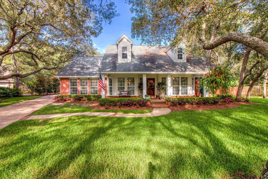 This gorgeous, southern style, 5 BR/ 4 Full BA custom home has a 3 car garage, on .59 acres, on a quiet cul-de-sac. This previous 'Parade of Home', is located in the gated golf community of Southwind in Bluewater Bay. 3 New HVAC's 2017 & NEW CARPET UPSTAIRS. 2 first-floor Master BR's w/ en-suites. Upstairs, bonus living room, bedroom & ensuite. Remodeled gourmet kitchen w/vaulted ceilings, creamy white cabinets, granite island and Viking gas cookto. Eat-in kitchen near gas fireplace. Dining room/office. Vaulted ceiling & gas fireplace in living room. Crown molding & tile in main areas. An additional wing added by Randy Wise, with sitting room, master bedroom and en-suite, tray ceilings and massive walk in closet. Master bath has tall his and her vanities, a makeup vanity, walk-in tile