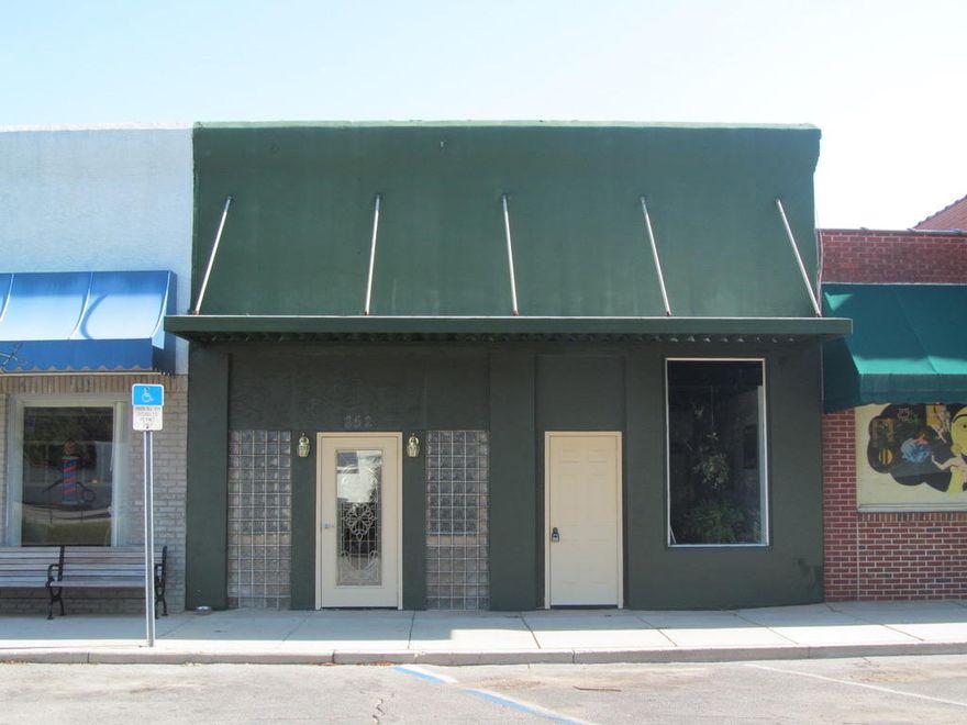 commercial building located on Baldwin Ave. in downtown historic Defuniak Springs. This is the perfect building to open a bar, restaurant, deli, office or any retail type of business. Exciting things are happening in downtown Defuniak Springs. Now is your opportunity to own a commercial building in the best small town in the state of Florida!!!