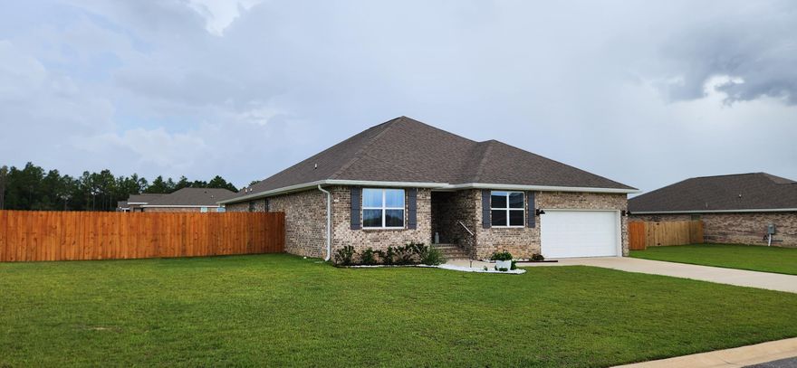 Beautiful Home Better Than New! Owner has added tens of thousands of upgrades to the property. Their loss is your Gain! Just some of the upgrades to mention; New upgraded pendulum lighting in the kitchen and Formal dining area. New upgrade ceiling fans in all rooms. Under cabinet lighting in the kitchen. 2' faux wood blinds throughout the home. Fully stained lighted security fence with a double gate with metal bracing to access he huge backyard waiting for your pool or garden area. And an irrigation system to keep the manicured grass and landscaping beautiful. The Sawyer model features over 2500 heated/cooled sq ft,  5 beds, 3 full baths, covered patio, 2 car garage plus smart security features and ring door bell. Inside you will find a Well-designed kitchen features: GORGEOUS Quartz counter-tops, stainless appliances, large island with breakfast bar, smooth-top range, built in microwave, quiet dishwasher and large pantry. Nice breakfast nook & separate large formal dining area and open to a huge Great Room. Striking Vinyl plank flooring & PLUSH carpet in the bedrooms. Large Owner's Suite and adjoining bath with a walk-in Closet beautiful Quartz counter-tops, double vanity, large shower, garden tub and with an extra storage closet. 4 other bedrooms are spacious in size, with one guest bedroom with bathroom next to it and and close the door out the covered patio. The home has wonderful curb appeal with a desirable over 1/2 acre corner lot. For peace of mind owner has a current Termite Bond Contract and will offer a 1 year home warranty. Make your appointment today to view this wonderful home!