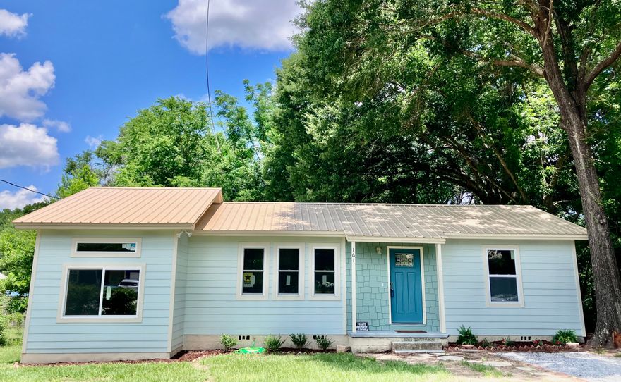 This beautiful 3 bedroom 2 bath home centrally located in the city of Crestview is ready for you.  This home has been completed rebuilt from the studs to include electrical, plumbing, ac/heat/duct work and spray foam insulation. Walking through the front door you will notice that no corners were cut redoing this beauty.  The beautiful hardwood floors and recess lighting is just a couple of things you will notice when you walk in. The open floor plan with a large living room, kitchen with granite countertops, soft close cabinets, new appliances, and an island perfect for entertaining. The split floor plan gives everyone privacy. The master bedroom features a large window for plenty of natural light, bathroom features an additional upgraded overhead shower head, plenty of lighting and a large master closet. The laundry room has plenty of room with easy access to the new hot water heater and access to the spacious shaded, level backyard and the deck that takes you around to the sliding glass doors to the kitchen. This home receives lots of natural light with the new energy efficient windows. This home has so much character and upgrades, you do not want to miss out on this beauty.