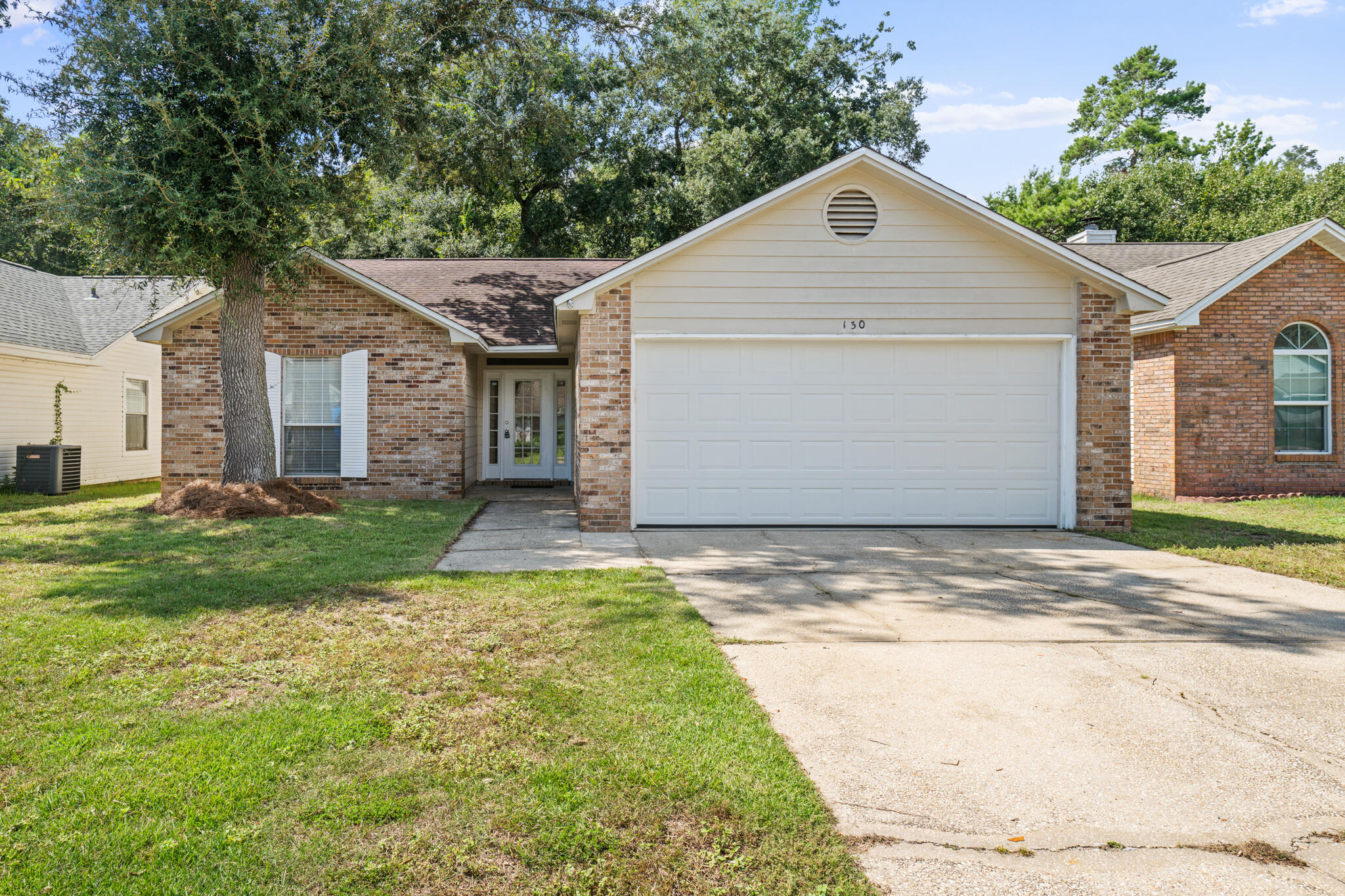 Take a look at this charming 3 bedroom, 2 bath home tucked away in Indigo Village a small neighborhood in Niceville, FL.  Just 10 minutes from the beautiful white beaches in Destin, FL, this home offers the perfect blend of coastal living and neighborhood charm.  The home has a functional and open floor plan, with a bright and inviting living area with vaulted ceilings that run from the living room into both the dining room and kitchen.  Indigo Village is a very family oriented neighborhood with fewer than 80 homes.  Roof is 2016 & HVAC is 2019