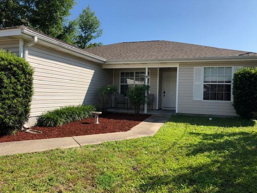 Private corner lot. NEW ROOF, NEW HVAC. Bamboo flooring in living area and bedrooms. A $2000 flooring allowance will be given to replace the vinyl in kitchen/dining area, laundry and bathrooms. Open and bright floor plan with high ceilings, split bedroom plan, separate dining area, large spacious kitchen, and nice deck in the backyard.