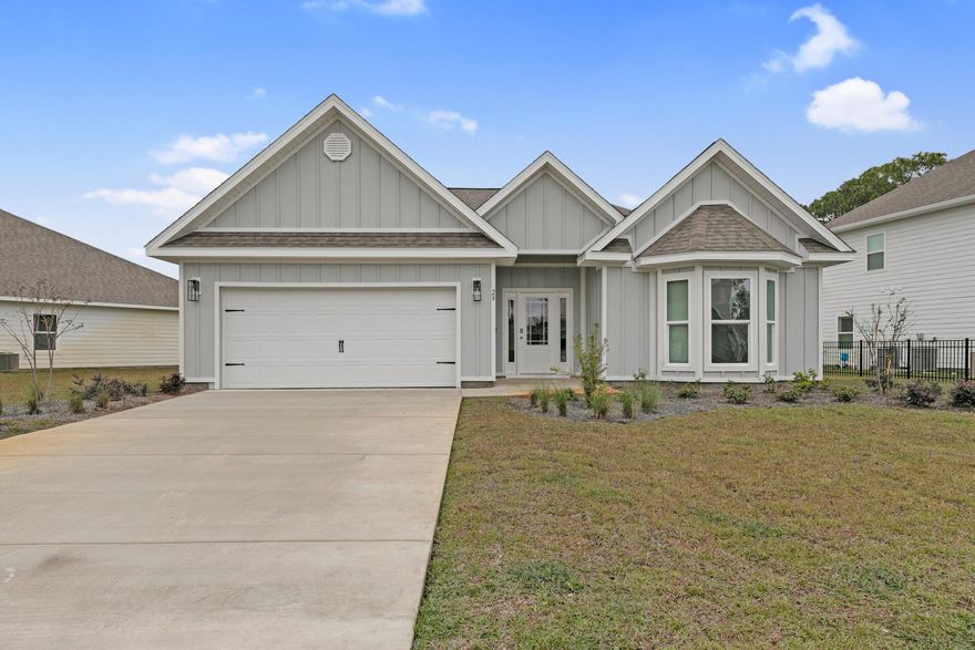 This new home features 3 bedrooms and 2 baths with a large backyard. The living room is the central point of this floor plan and is open to a large eat-in kitchen with quartz countertops and an under-mount farmhouse sink in the center island and a large pantry. Appliances include a smooth top range, dishwasher and microwave. Just off the living room you will find the master bedroom  overlooking the back yard. The main bath has a dual sink vanity with quartz countertops, tiled shower with glass door, a large soak tub, and a walk-in closet.