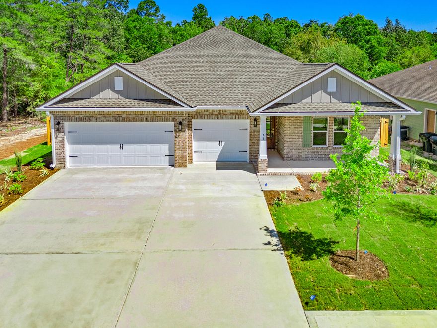 Builder Incentives inc most of the closing costs! Custom, spacious 5 bdr, 3 bath home. Features include an open concept great room, dining and kitchen, all overlooking the backyard and nature preserve. Spacious MBDR and bath w/a walk in shower and separate soaking tub. Laundry w/sink. A 3 car garage-w/ attic access for storage, 10' ceilings, w/12' ceiling in great room and mbdr. Custom soft close cabinetry w/Quartz countertops, 7' crown molding, tile and LVP flooring (no carpet) tankless water heater, ceiling fans, window blinds and more! Professionally landscaped w/sprinkler system and well. Gutters and a 6' high privacy fence w/gate already in place.  (Features List is inc. in the document section.) This exceptional community offers access to the extensive array of Hammock Bay amenities