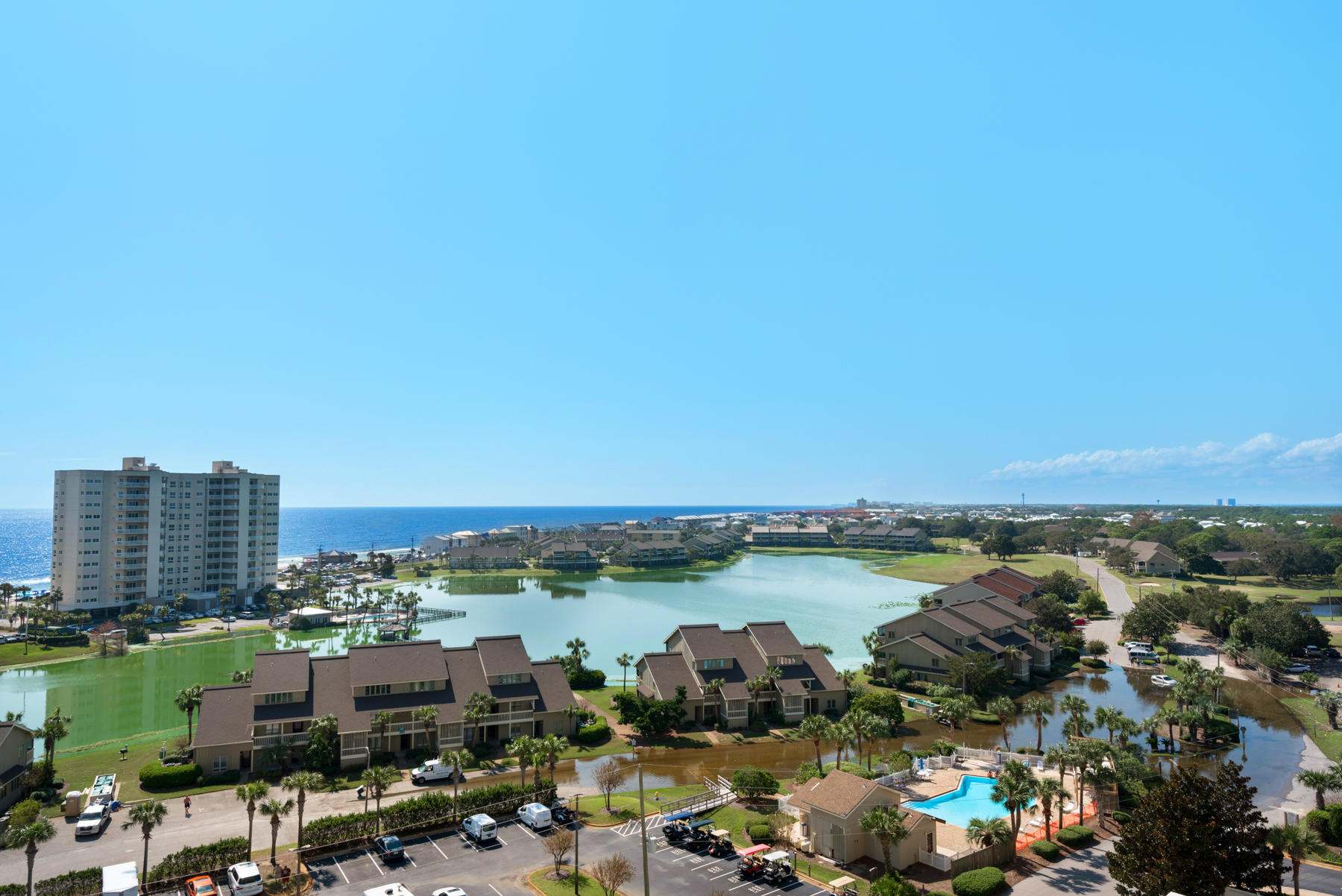 Don't miss this best buy at Ariel Dunes II, only a very short walk to the sugar white sand and emerald green waters of the Gulf of Mexico. This 10th floor 2 bedroom/2 bath with bonus bunk room is a highly desirable floor plan. The very large terrace with access from the living room and master bedroom provides incredible views. The current owners have taken especially good care of this unit with recently added new tile flooring in the bedrooms, A/C, refrigerator, washer/dryer, and partial new furnishings. Ariel Dunes is located inside the gated Seascape Resort which offers an 18 hole golf course, 3 pools, Cabana Cafe onsite, tennis, fitness room and more. There are also many restaurants, shops, including the Silver Sands Outlet Mall, entertainment venues and more just a short walk or drive