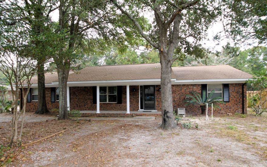 Lovely Lake Lorraine Location. This great house sits on a large, level lot and backs up to Eglin Preserve for lots of privacy. With 4 bedrooms, 2 bathrooms and 2 living areas this home lives large. The house has been completely painted inside and out and new carpets and fans have been installed in all bedrooms. Roof replaced Oct 2013, AC 2010, water Heater Oct 2017. House rewired with copper 2017.
