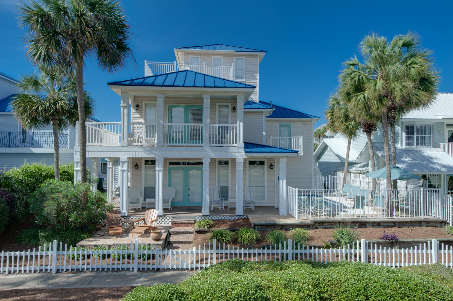 Location, views and charm all rolled into one beautiful 6 bedroom 4 bath home. Enjoy the views from one of five balconies or take a quick dip in the (heated) swimming pool. There are two public beach accesses within walking distance. The first floor has two guest bedrooms, a guest bath, the kitchen, dining and family room are a large open floor plan perfect for lounging or entertaining. The second floor features the master bedroom with its own private balcony and 2 more guest bedrooms with private balconies. There are 3 baths on the 2nd floor. The Third floor bedroom also has a large roof top balcony for enjoying the great outdoors and the Florida sun. Don't miss the opportunity to own a front row home in the much sought after Crystal Shores Subdivision.