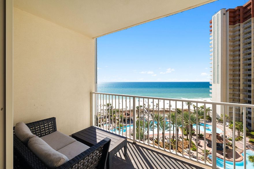 Shores of Panama, unit 918, is a 9th floor condominium with a gross annual rental revenue of $51,470 for 2022.  This turn-key unit conveys fully furnished, with 1,066 sq ft of professionally decorated living space with two bedrooms, two full baths, one half bath and additional hallway bunks and a sleeper sofa in the living room, optimizing the sleeping arrangements for up to 8 people comfortably. Conveying with a dedicated, deeded  parking spot and possessing close proximity to both the elevators and parking garage, this unit has maximum convenience for potential renters and owners alike. .  Notable features include a master bedroom facing the Gulf of Mexico, a spacious balcony with excellent water and pool views, a well equipped kitchen with granite countertops, extra seating, spacious pantry, tasteful coastal furnishing and tile flooring throughout. The mild winter climate and ample unit size coupled with one of the largest lazy river style pools in the Panhandle creates an oasis for owners and guests to enjoy, relax, and entertain year round.  Shores of Panama is a gulf-front condominium that is within excellent proximity to all that Panama City Beach has to offer;  a myriad of world class shopping, entertainment and dining is located nearby, including the renowned Pier Park commercial & entertainment center. Shores of Panama offers excellent amenities for families to enjoy including multiple lagoon style outdoor pools, an indoor pool, a sauna, two tiki bars, steam room, multiple elevators, a coffee and pizza shop on-site and a fitness center with a health bar and spa. It's also located next to the famous Pineapple Willy's waterfront restaurant.