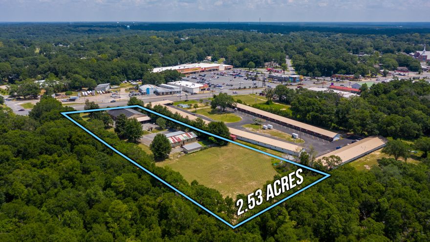 Commercial property located in the heart of Crestview.  This property has tremendous potential with many different potential uses.  Property is located in HWY 90 (W. James Lee Blvd) in Crestview just across from the Tractor Supply and Dollar General anchored shopping center.  With approx. 21,000 AADT and 178 ft of frontage property is easily accessed and has great visibility. Property features a 5,400 sf office building and a 1,800 sf second building that is currently configured as a residence with 3beds and 1.5 bath.  The front office building is 60x90 and is configured with offices and bathrooms.  This building can easily be divided into 2 30x90 ''boxes''.   Property is currently occupied by church on month to month basis. Tenant will vacate prior to closing.