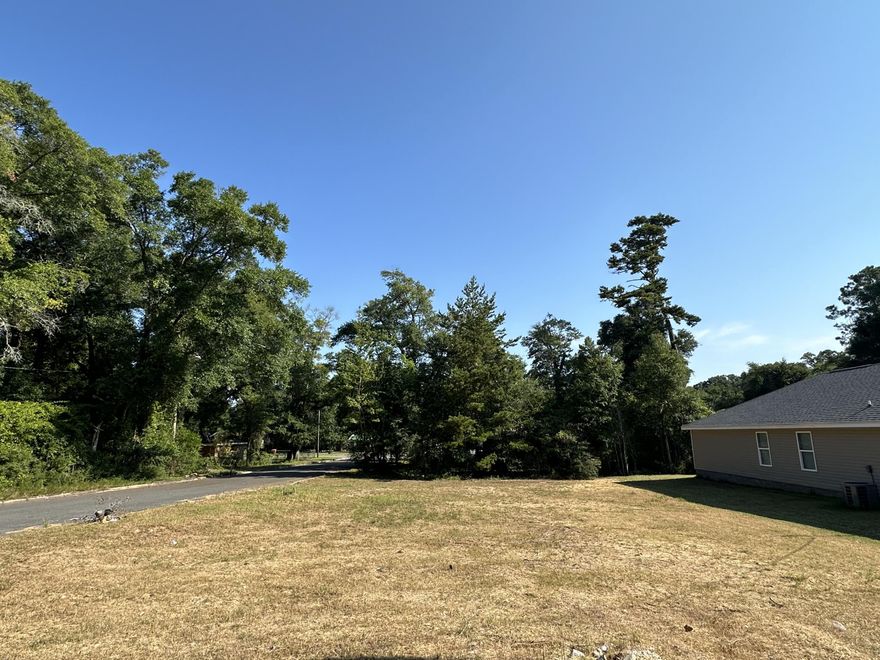 Corner vacant lot. Build a home next door to two other new construction homes. Seller has two lots on W Walnut and willing to package.