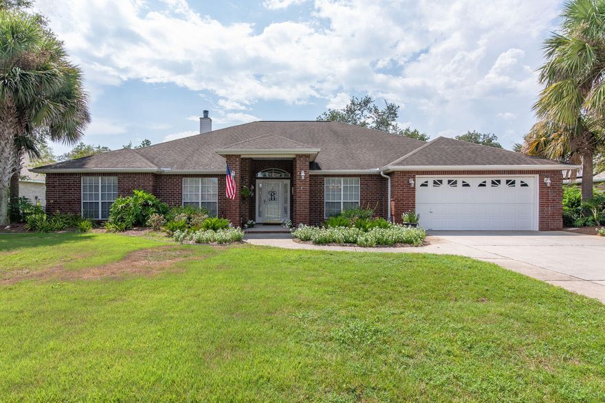 You will fall in love with this large elegant  4 BR/3BA  former Parade of Homes winner.  Fantastic spacious open floor plan. French doors open to office and dining rooms off entry. Large great room with triple sliding doors, vaulted ceilings, built-in bookcases and fireplace w/mantle. Large island kitchen with granite counters, breakfast bar and drop down lighting. Tiled kitchen features custom cabinets, smooth top range, wine rack, walk in pantry and separate eat-in-kitchen area. Oversized master bedroom suite. The master bath has cultured marble 36'' dual vanity, separate shower, whirlpool garden tub and two walk-in closets. Three additional large bedrooms  and two more full bathroom. There is a laundry room and a 2 car garage.  Great view of the golf course across the street.  Well planned spacious outdoor living space includes a large open lanai, the most beautiful majestic oak tree with lush greenery and vegetation, ambiance night time lighting makes it the perfect place to relax. It's the perfect location with exclusive use of multi-million dollar recreation center w/pools, tennis and fitness center. Conveniently located near schools, shopping and beaches. 