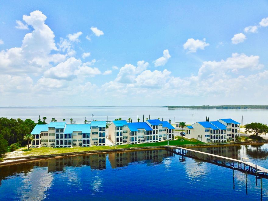 Waterfront condo just across the bridge from Tyndall! Excellent primary residence or investment property that comes with usage of a deepwater boat slip! This is a second floor unit with stair access, one bedroom one bath. There is a waterfront balcony to enjoy the Bay view and breezes! This condo is surrounded by the Bay on a peninsula - the back of the condo has picnic tables on the beach! A great place for watching the air show! All information given here is approximate - if important, please verify.