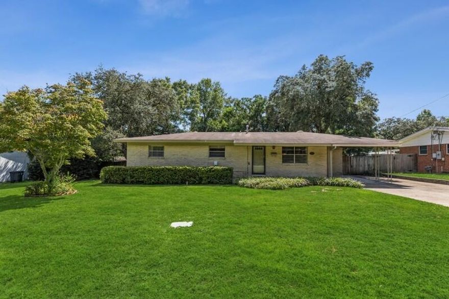 Be sure to call and ask about 100% financing options! Cozy 3 bed 2 FULL bathrooms home in a fantastic location! There are beautiful hardwood floors throughout most of the home, and updated appliances, roof, and HVAC were updated in 2011-2012. The backyard features a MASSIVE screened-in back porch with an outdoor kitchen set up with a grill, built-in seating, cabinetry with a sink, and running water. This is PERFECT for entertaining guests and there is plenty of space! There is an adorable shed out back with the cutest attached porch. Conveniently located just two miles from Eglin's east gate and close to both the park and library. This home has been updated throughout the years and has been well maintained with owners who have loved this home and taken such great care of it and it shows!