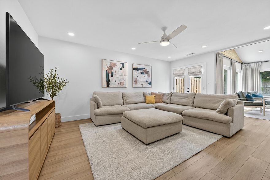 Step inside this updated end-unit townhome in Perdido Bay Villas, where thoughtful upgrades and a bright, inviting layout make it move-in ready! Featuring a 2022 roof, 2025 water heater, and all impact glass windows, the home has been thoughtfully upgraded and permitted by the county. (See notable features in MLS docs). This property is also a great opportunity for a short term rental with projections coming in at $23K+! With two spacious bedrooms, each with a private en suite bathroom, a sunroom, and inviting living spaces, this residence is ideal as a primary home, vacation retreat, or short-term rental investment. Inside features warm wood-look flooring, a neutral paint palette, and recessed lighting throughout! The kitchen has been beautifully renovated with soft-close white cabinetr y, quartz countertops, a modern backsplash, black hardware and accents, and stainless steel appliances. A breakfast bar and adjacent dining area provide plenty of space for entertaining. From here, step out to a private courtyard perfect for grilling or enjoying outdoor meals! The spacious living room, anchored by a striking wooden staircase, flows seamlessly into the sunroom, which features a vaulted ceiling and rich wood and brick accent walls that add warmth and charm. French doors lead outside to a concrete patio and a communal green space, extending your living area outdoors. A remodeled half bath with a new vanity and quartz counters conveniently between the kitchen and living room. Upstairs, the primary suite offers a private balcony overlooking the outdoor area. Both baths are equipped with tiled tub/shower combos, large vanities, and quartz countertops. With modern updates, thoughtful design, and a prime location, this move-in ready townhome is the perfect full-time residence, vacation getaway, or investment property!