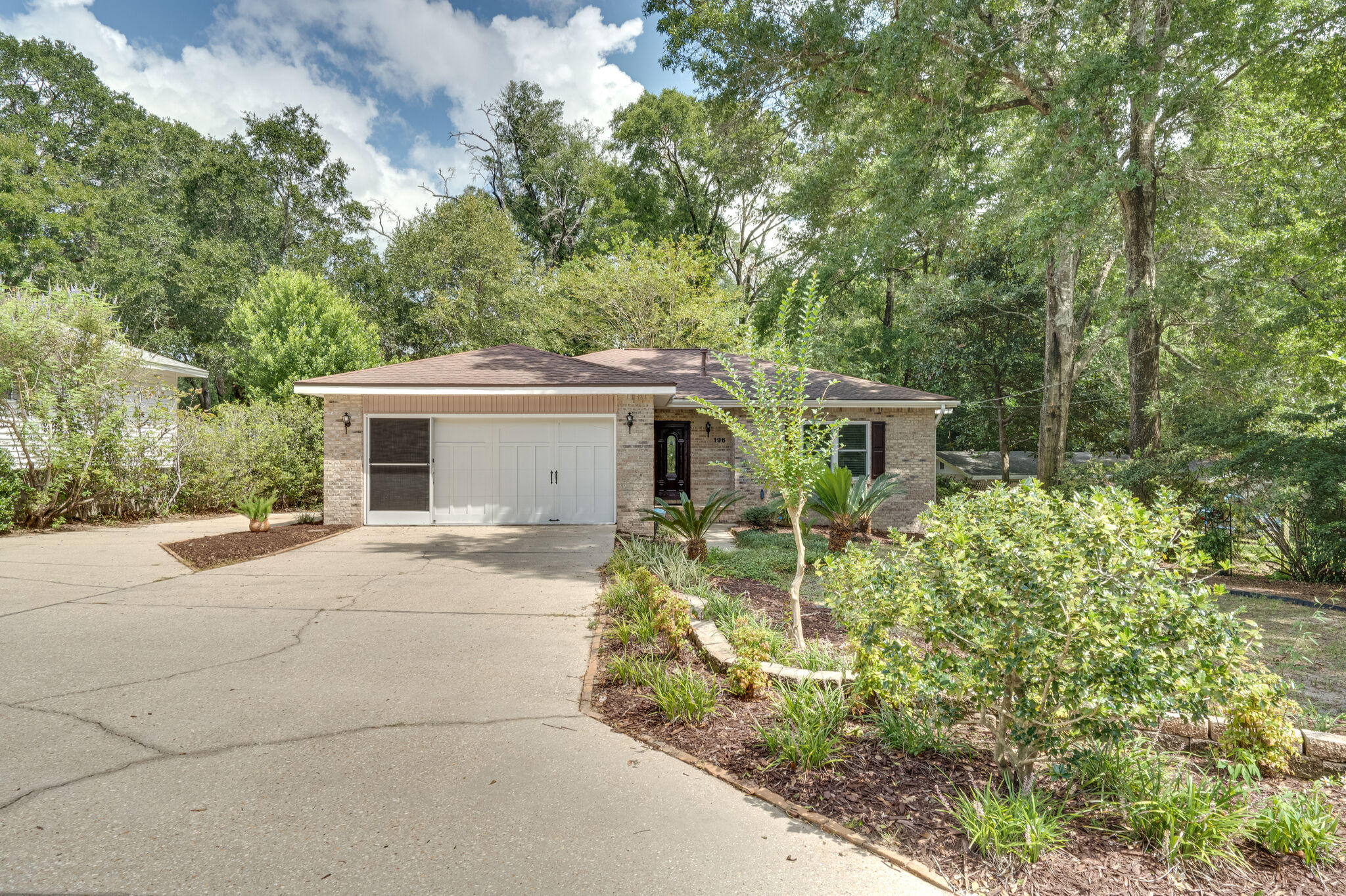 BEAUTIFUL family home in Valparaiso, FL. Centrally located, just a few minutes away from the EGLIN AFB (East Gate). Walking distance to the Heritage Museum, restaurants, bank, day care, elementary and middle schools. Just a couple of blocks from the beautiful Lincoln Park and the public boat ramp. This pride of ownership home has many great features and upgrades. Split floor plan, remodeled kitchen with granite counter tops, custom made cabinets, gas stove, recess lighting and upgraded appliances. Hurricane rated windows, new A/C system in 2019. Perfect for entertaining!The cooled/heated sun room connects to the relaxing private backyard, enhanced by the extended decking, mature trees and a beautiful Koi pond.