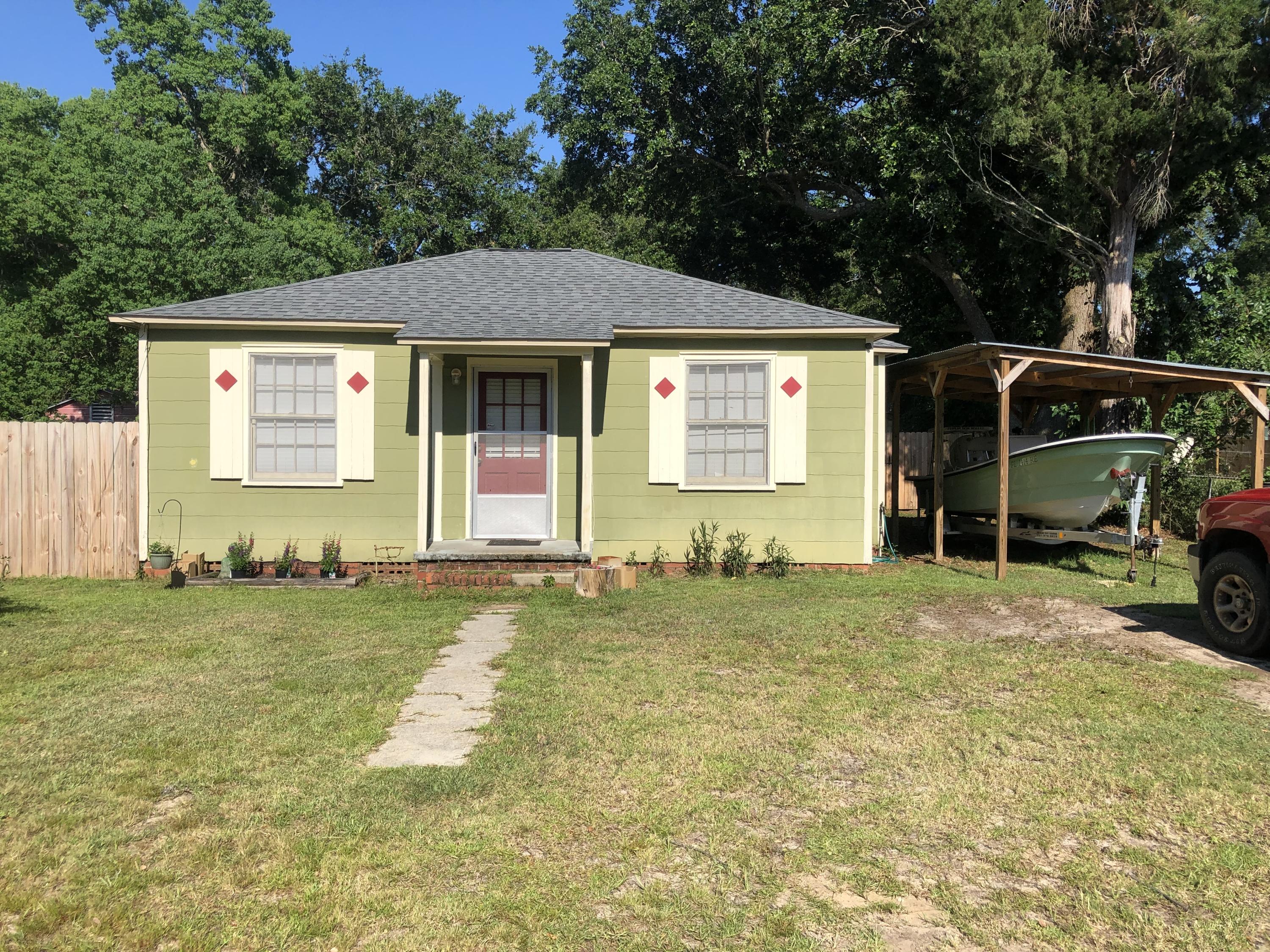 Located in the desirable Navy Point subdivision, this charming cottage style has been lovingly remodeled with an open concept living area all while preserving its original charm. Updates include custom kitchen cabinets, refinished hardwood floors, wood look 2-inch blinds, HVAC unit (2016), roof (12/2017), privacy fenced backyard, open-air shower, 16x24 workshop and extra storage! Navy Point is located on Bayou Grande and has a 2.5 mile waterfront walk/bike path, boat launch, playground and neighborhood beach. This delightful home will not last long so call agent today!