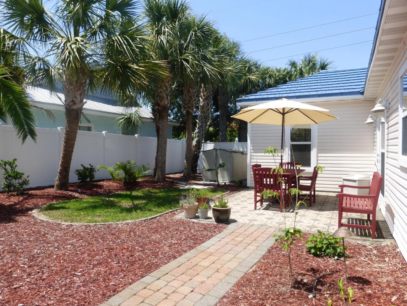 Lowest price home in Crystal Beach. Great value. Very well maintained newer home.Desirable Crystal Beach area! cozy beach cottage! just 8 minutes to the sand. Fabulous 3 bedroom home. Front door has etched glass. Everything has been updated with new kitchen, cabinets and granite. Freshly painted, crown molding, new fans, new AC and hot water tank. Newer bathrooms, tile and new carpet. Commercial size stackable washer/dryer. Home has a metal roof installed in 2005. Fenced in backyard with brick pavers and storage for lawn equipment. Complete privacy. Home is in excellent condition. Walk to Shopping, Restaurants, Movie Theatre and Entertainment! A must see to appreciate the details & charm of this home. buyer to verify all room dimensions.