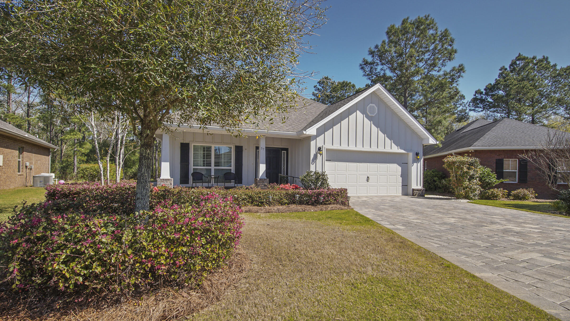 *MULTI OFFERS* This property has so many upgrades: premium cul-de-sac lot that backs up to The Preserve, the beautiful paver driveway which extends to the front porch, sidewalks around the entire house, pavers in backyard with stone fire pit, whole house gutters, mostly brick exterior with Hardy front, plantation shutters throughout, gas fireplace, wood look tile throughout, no carpet, granite counter tops, tile backsplash, SS appliances, gas stove, under cabinet lighting, beautiful cabinets, lots of crown molding, trey ceilings, bath fitter tub with jets, walk-in showers in both baths, washer and dryer convey, laundry sink in garage, pull down stairs to attic and even comes with plywood for windows (hurricane protection). Must See this one!