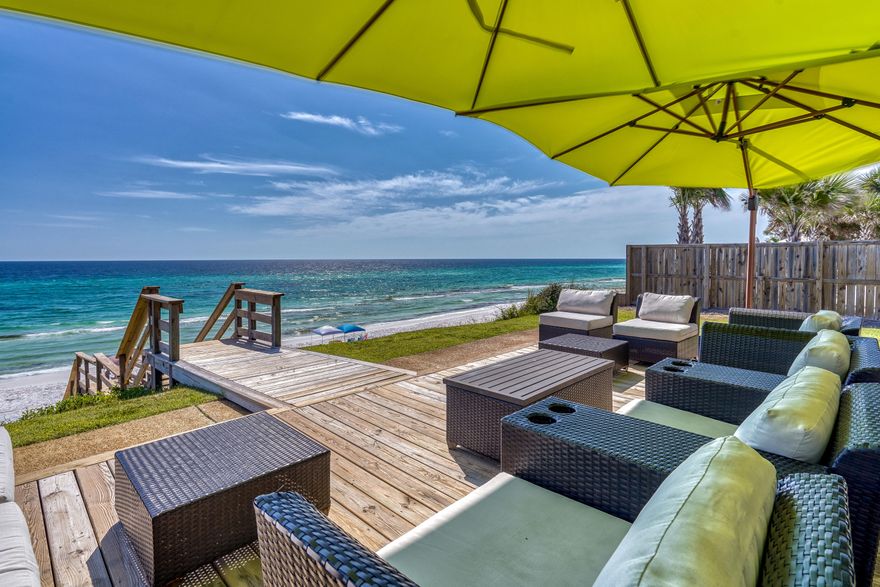 Rare Gulf-Front Opportunity on Scenic Highway 30A & walking distance to Seaside. Boasting 60 feet of direct Gulf frontage, this exceptional property is located along the highly sought-after stretch of 30A known as the ''Miracle Mile,'' perfectly positioned between Seaside and Seagrove Beach. Elevated on a natural bluff, the home enjoys commanding, panoramic views of the Gulf of Mexico and direct private beach access. This offering presents a unique opportunity to build a custom Gulf-front residence or enjoy the thoughtfully updated beach cottage currently in place. The residence features a light-filled, open living area oriented toward the water, creating an effortless connection between indoor living and the coastal landscape beyond. The kitchen is well-appointed with quartz countertops, stainless-steel appliances
and casual seating, ideal for relaxed coastal living. The primary suite provides a private retreat, while additional guest bedrooms, including a generous bunk room, offer flexible accommodations for family and guests. Outdoor living takes center stage with a Gulf-front porch designed for taking in sunrise views, coastal breezes, and unforgettable sunsets. Ideally located near Highway 395, the 30A bike path, and Seaside's shops, dining, and year-round events, this property combines convenience with unmatched beachfront presence. Properties with this level of frontage, elevation, and location are increasingly rare, an outstanding opportunity to secure a premier Gulf-front homesite along Scenic Highway 30A.