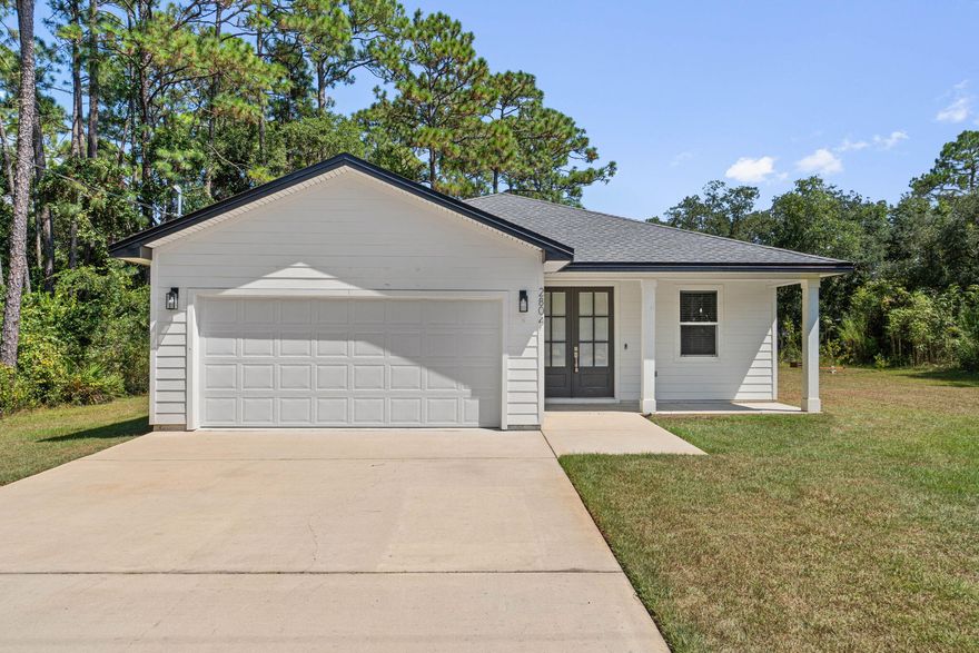 Step into contemporary comfort at 2804 Teepee Road in Navarre, FL. Built in 2021, this 3-bedroom, 2-bathroom home spans 1,549 square feet, offering a spacious and inviting open-concept design perfect for today's lifestyle. The kitchen is a standout feature with its elegant quartz countertops, combining both style and durability. The home flows with unique floor patterns that capture the warmth and character of natural wood, complete with realistic grain patterns and color variations. Nestled in a neighborhood on the rise, this home represents a prime opportunity for future appreciation growth in an area that is rapidly transitioning. It offers an excellent investment for anyone looking to settle into a vibrant community, just minutes from Navarre's beaches, shopping, and dining.