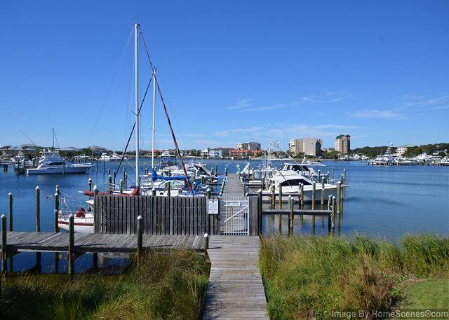 Rental Machine bringing in $49k so far in 2023! This coastal, turnkey unit is a rare, coveted spot overloooking the Harbor.1 bedroom with King bed in Master, built in bunks + sleeper sofa accommodates 6. Vaulted ceilings, spacious balcony and washer/dryer. Unit has been freshly repainted, shiplap added, brand new sofas, water heater replaced in June of 2022, Nest Thermostat, Ring door bell camera. Unit 9224 is on Sandpiper Cove Rental Program with bookings to transfer. Join this gated community with direct access to the white sandy beaches and amenities galore available at Sandpiper Cove including a marina, 5 pools, 3 hot tubs, 6 tennis courts, a Par 3 9 hole golf course and 2 onsite restaurants.