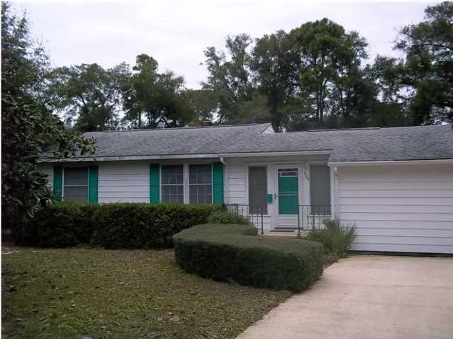 SELLER IS READY FOR YOUR OFFER! Awesome middle of town LOCATION!!! Large fenced lot. Short walk to the Water Front Garniers Beach Park. You can see it from your driveway. Large home in need of updating. Original home had 2 bdrms & 1 bath. A Master suite was added on at a later date. Master suite features a walk-in closet and sliding glass doors that lead you onto your nice screened patio. Two living areas to enjoy. Open living/dining combo w/ remote control gas fireplace. Kitchen with pass thru to living area has all appliances in place. An attached hobby area/workshop. Plenty of driveway parking & a carport is attached. Prideful curb appeal. If you are looking for a ''fixer upper'' large home, in a wonderful neighborhood, this is a must see! Bring us your offer! Please have your