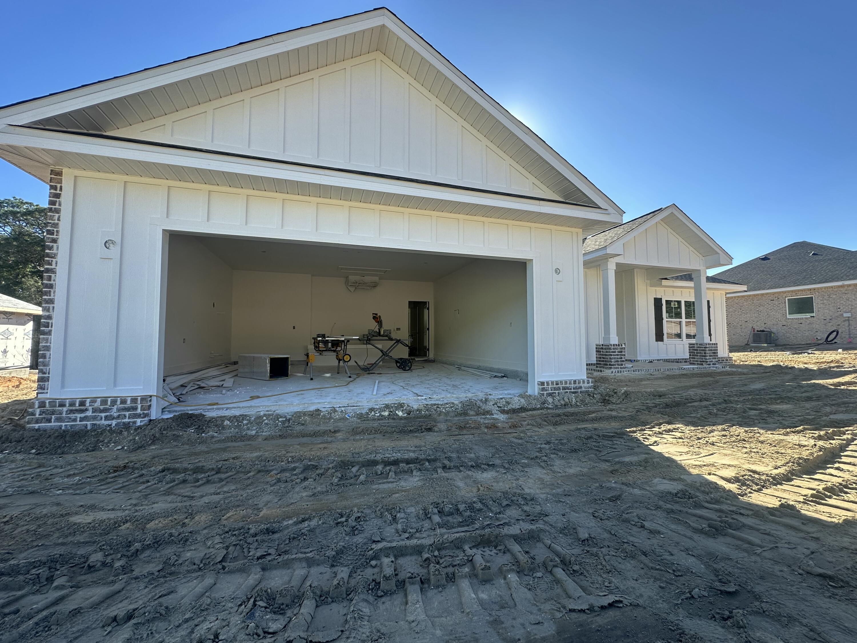 NEW Home South Crestview, under Construction! Huge Wooded lot! This home will be complete with exterior brick and hardy accents. The home has 4 bedrooms 2.5 baths and an open floor plan for family and friend to gather. Located at the South end of Crestview with new growth and just a short drive to beaches, bases, local schools, hospital, south Publix, restaurants, and Crestview Commons, Hwy 85 and I-10 are in close proximity to the property.Some of the photos may be samples of the builders' previous homes.